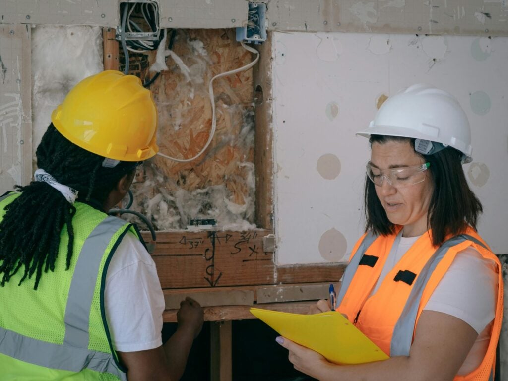 Female Workers in Hard Hat on Site