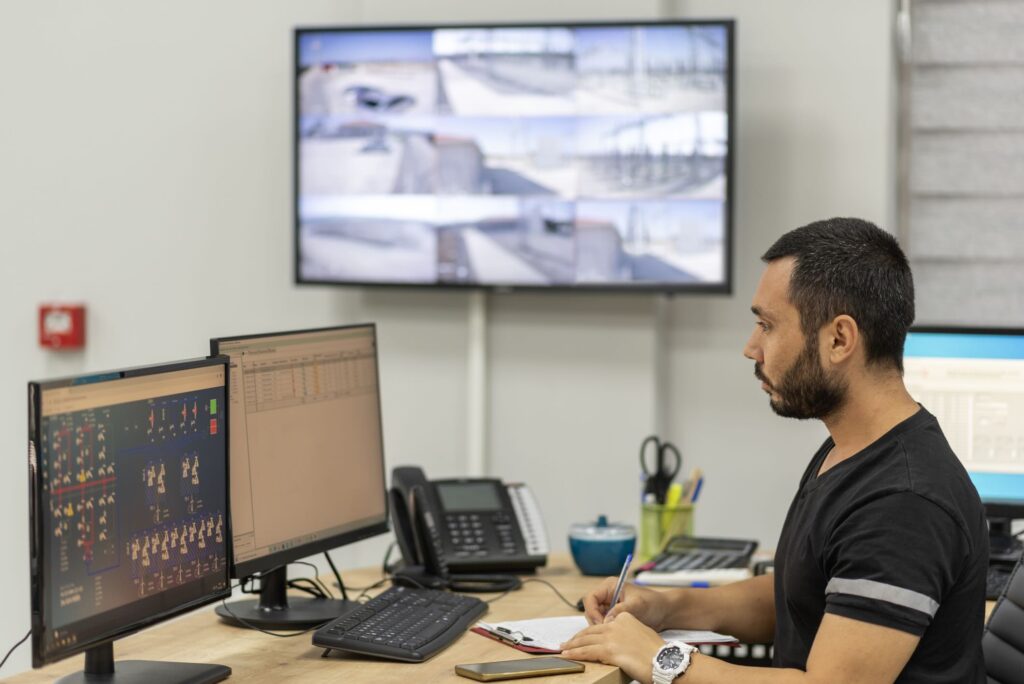 power plant control room operator working